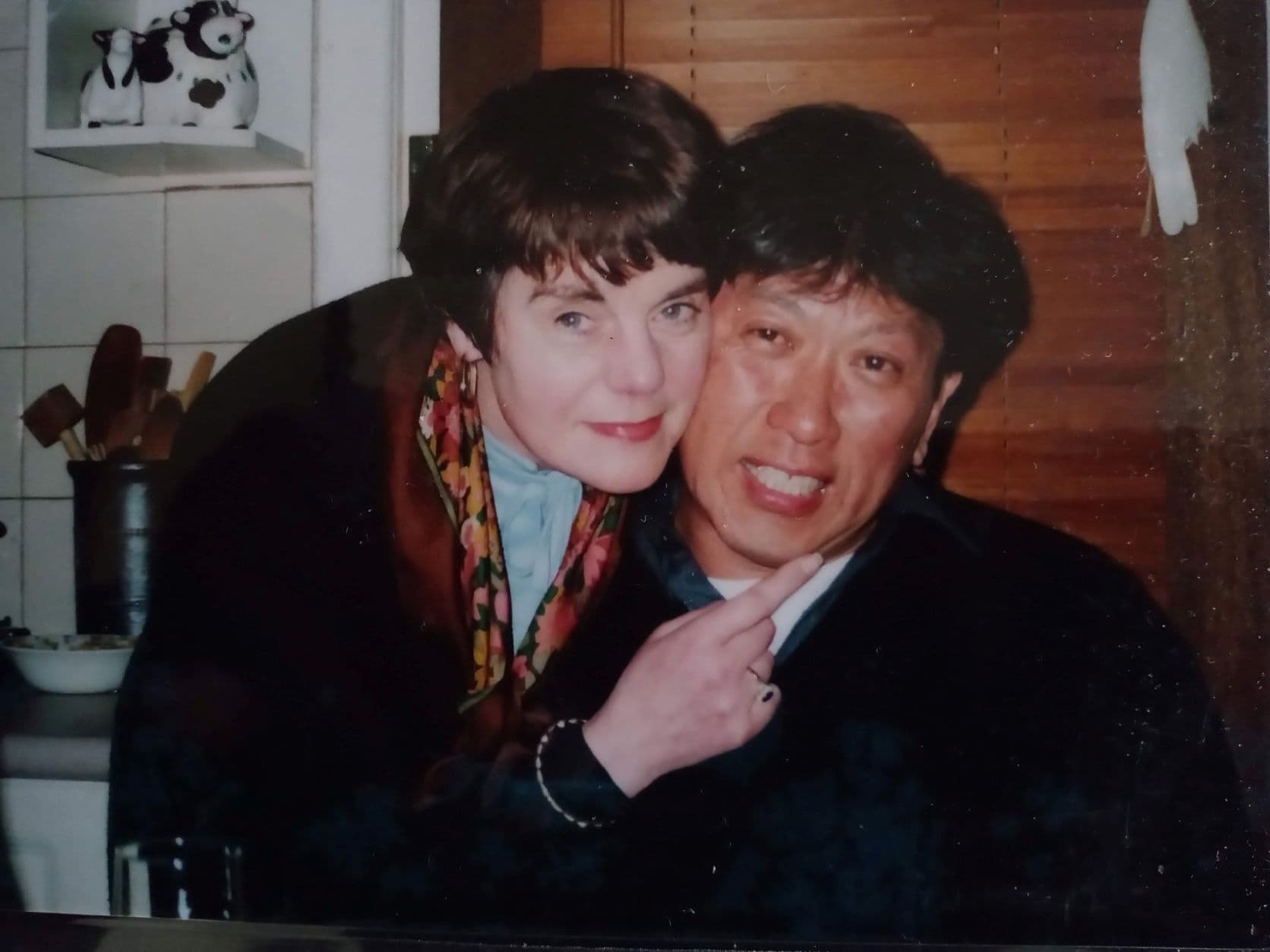 Deidre and lin embrace and smile for the camera