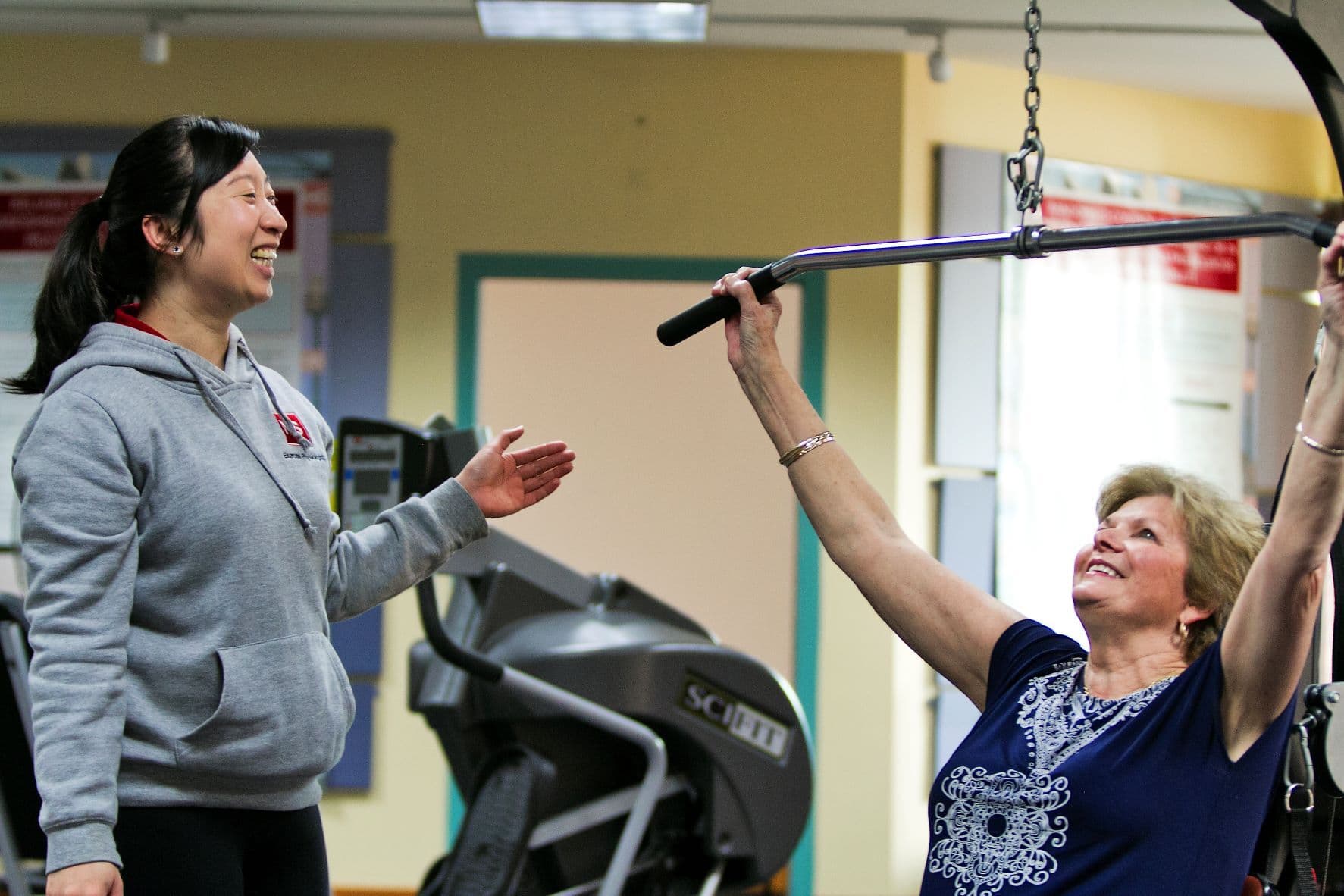 ms plus rehab staff smile with client