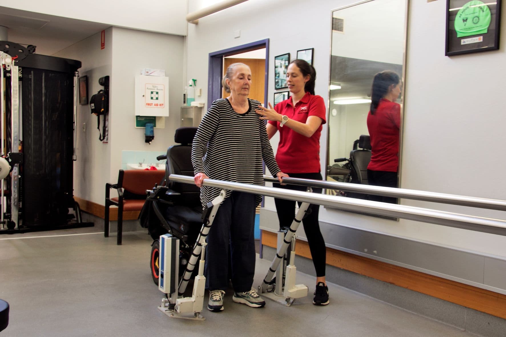 ms plus staff assist client walking