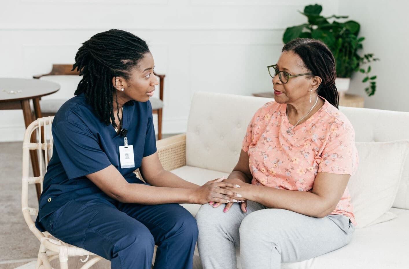 Healthcare worker compassionate care woman with ms